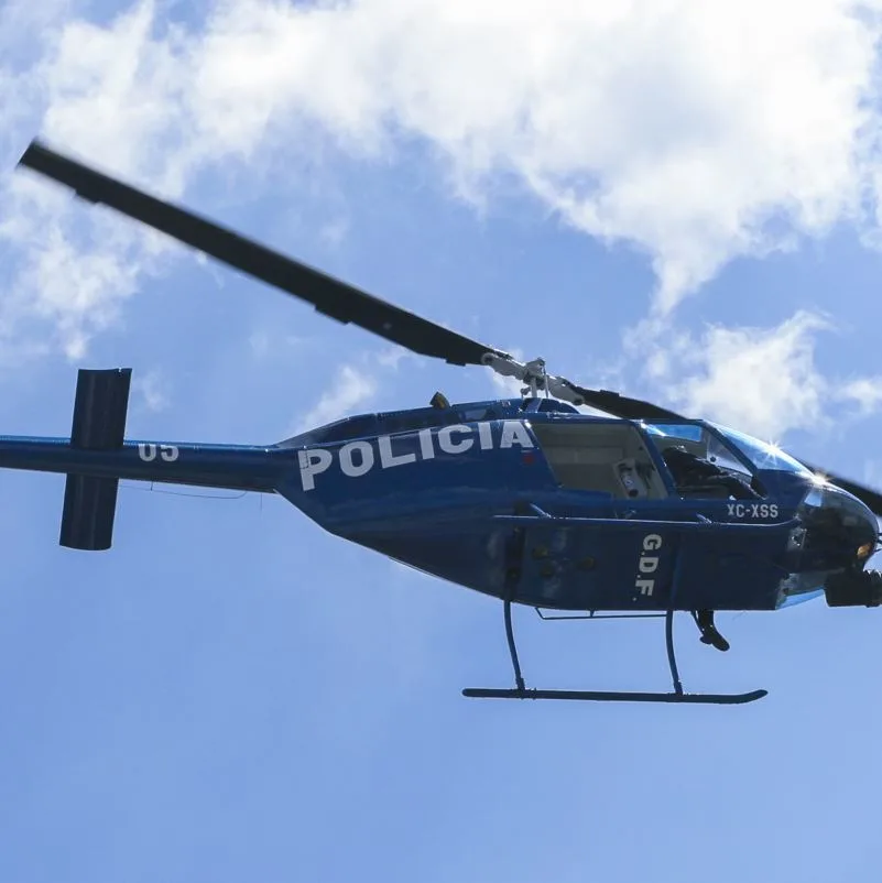 Mexican police helicopter in flight