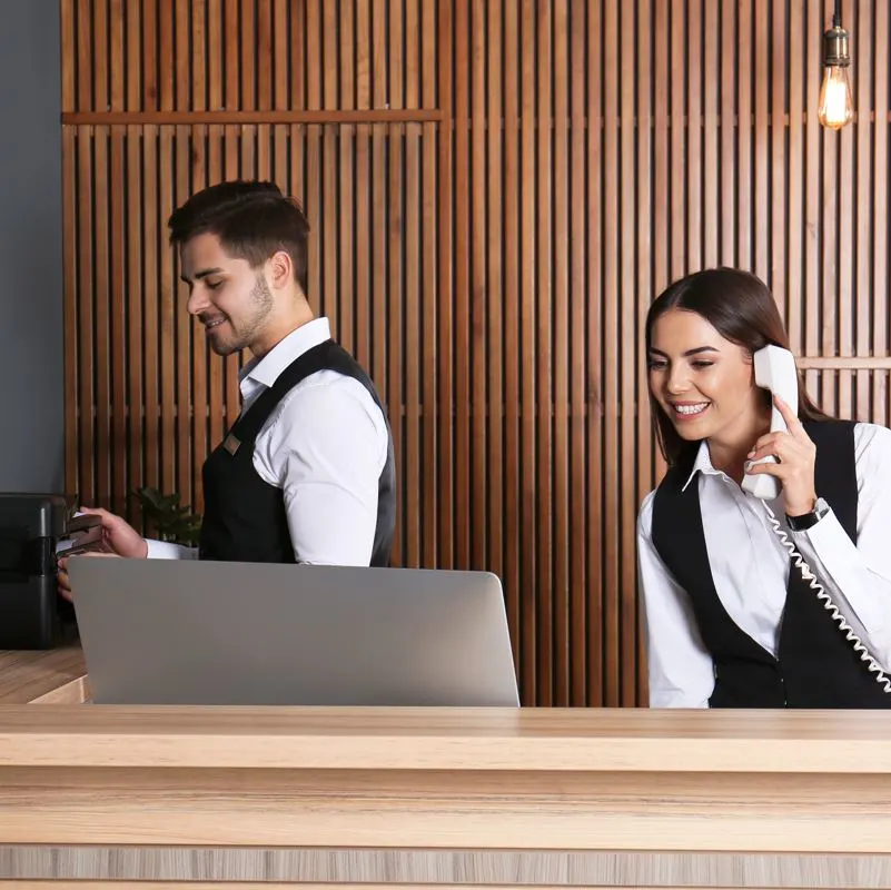 Reception staff working at a resort