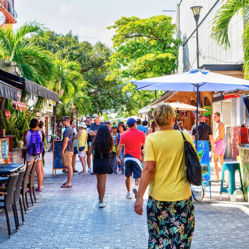 A busy shopping street in the Mexican Caribbean