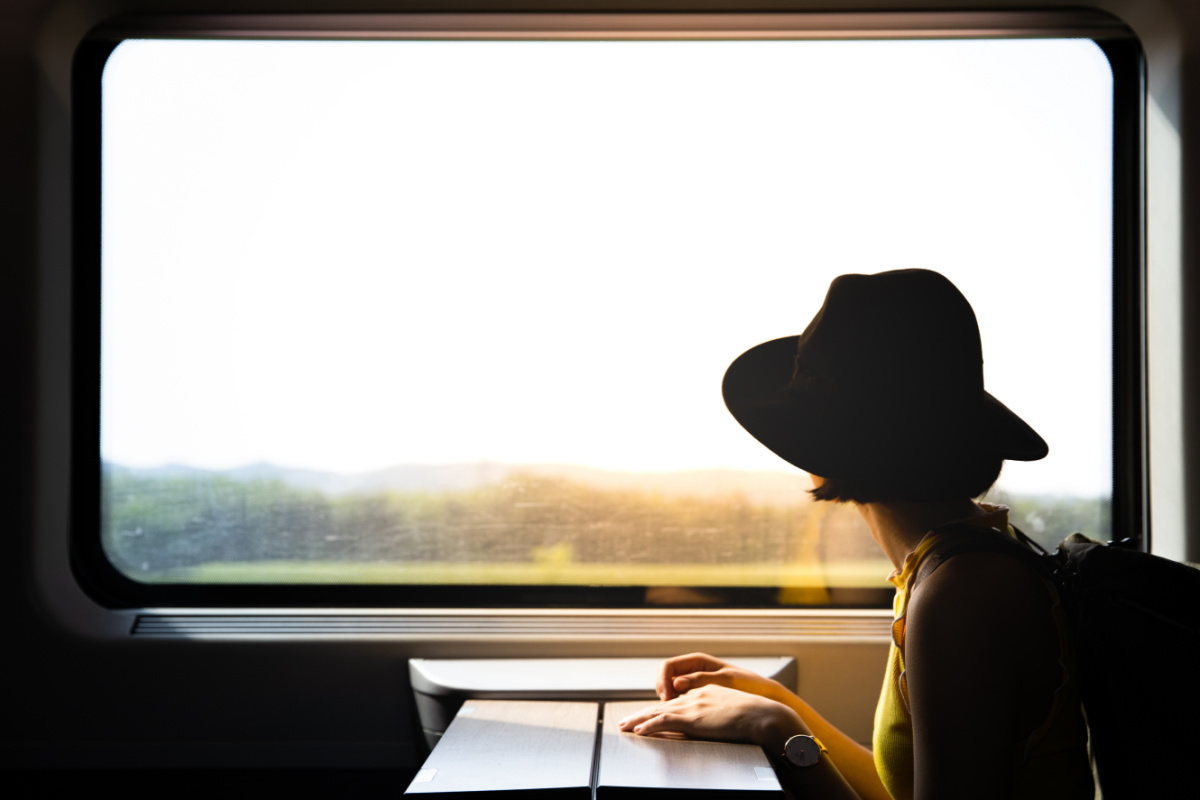 Woman looking out of train window