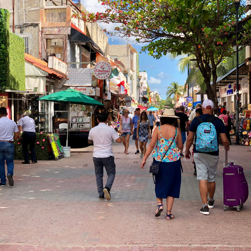 shopping area in Cancun with tourists 