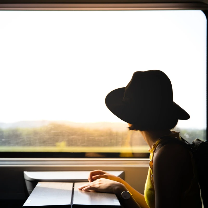 woman looking out of train