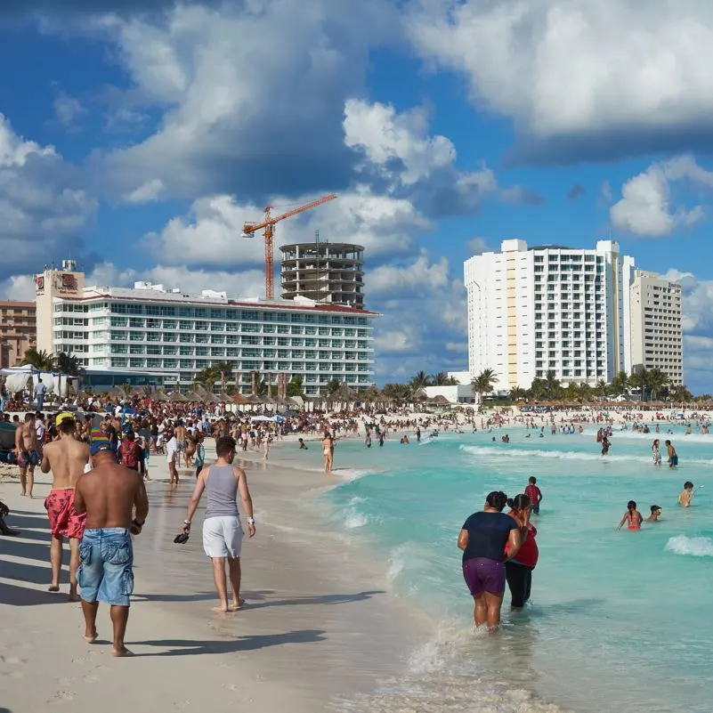 TOurists on a Crowded Beach in Cancun, Mexico