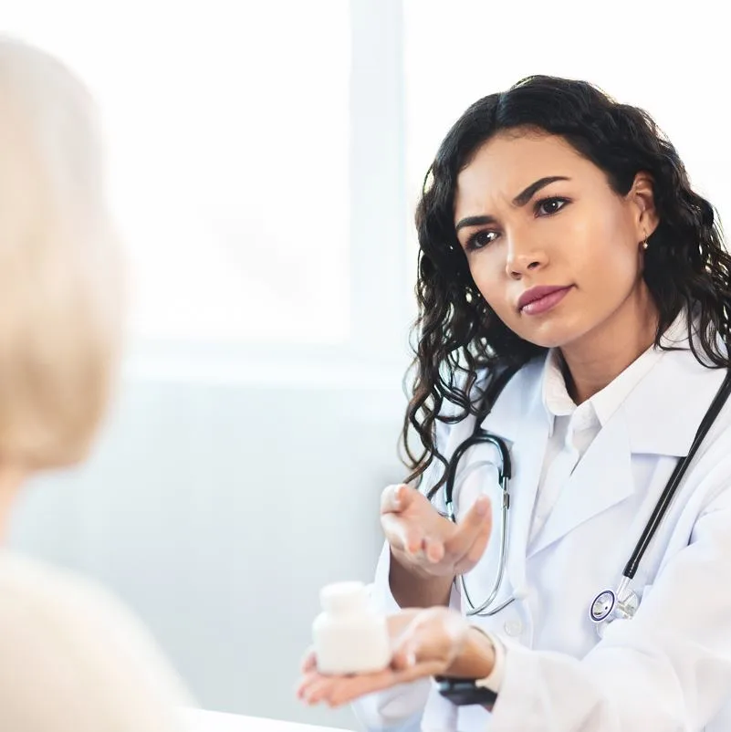 A doctor giving travelers a consultation