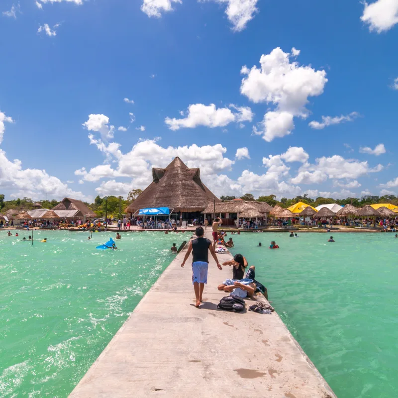 People on a dock in Bacalar