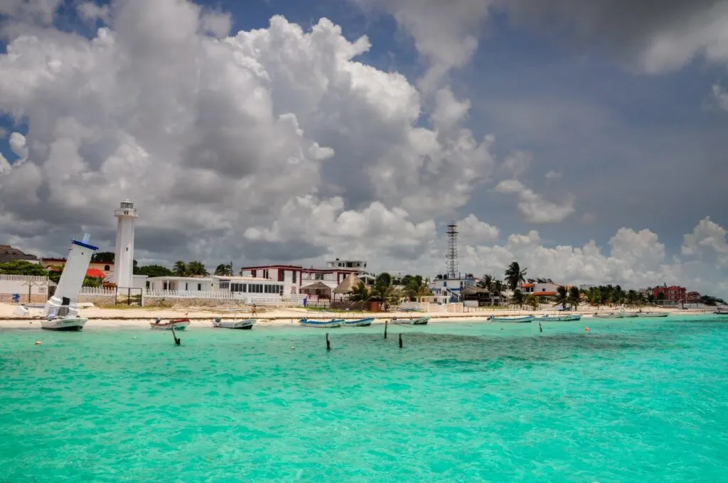 fishing boats anchored in Playa Morelos, with a very cloudy sky