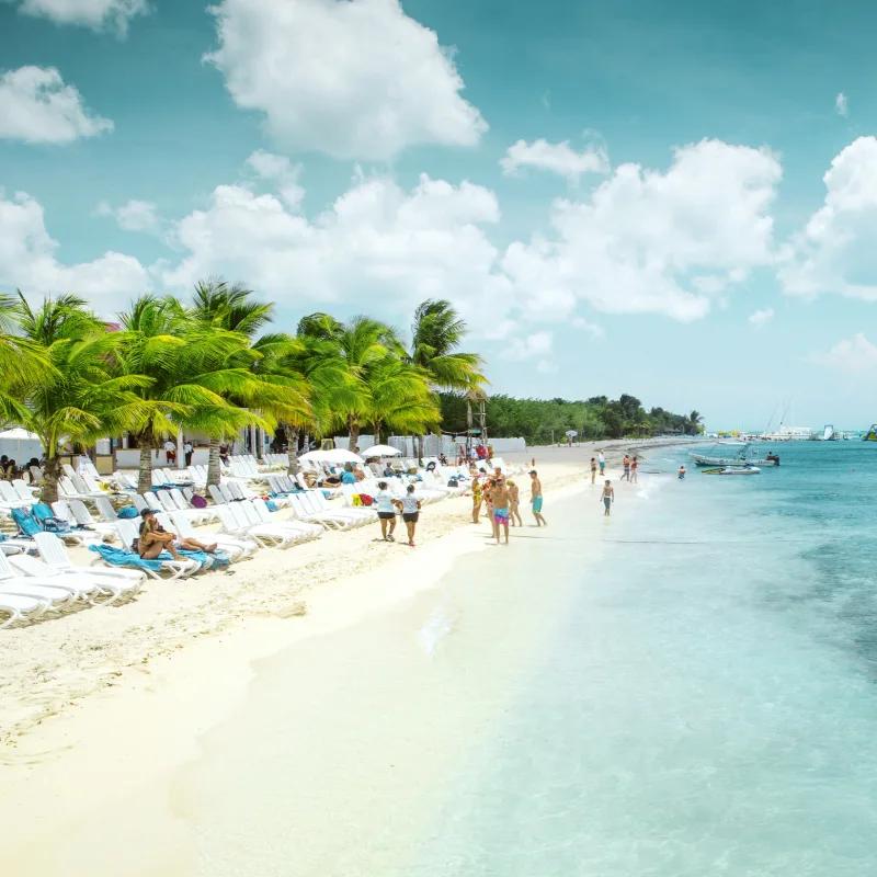 Tourists on a Beautiful Beach in Cozumel, Mexico