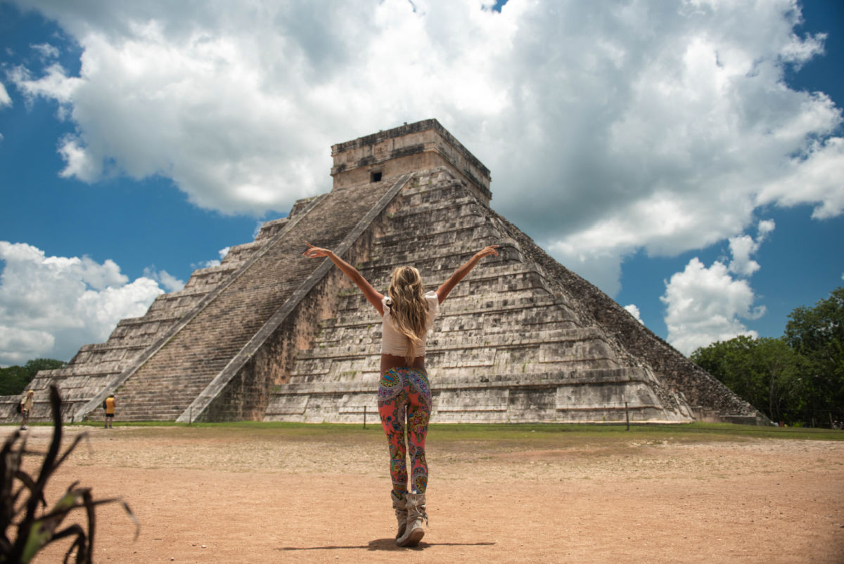 Tourist exploring Mayan ruins in Mexico