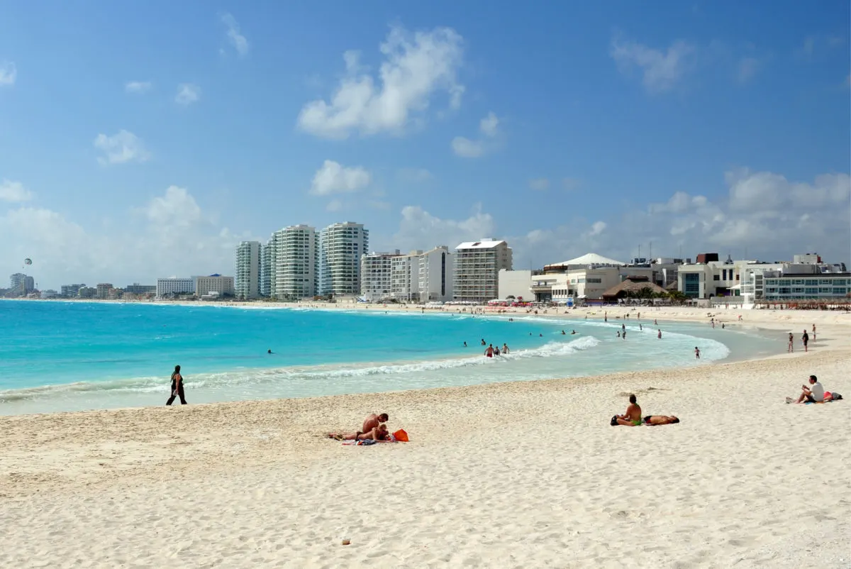 Tourists on the beach in Cancun