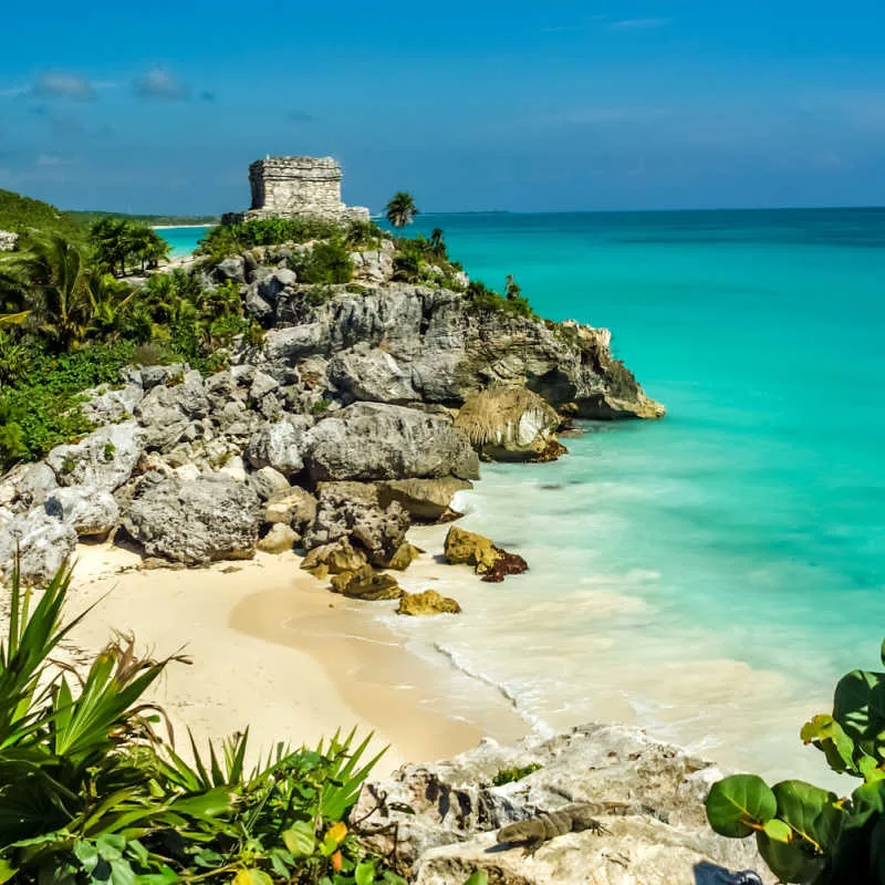 A white sand beach and ruins in Tulum