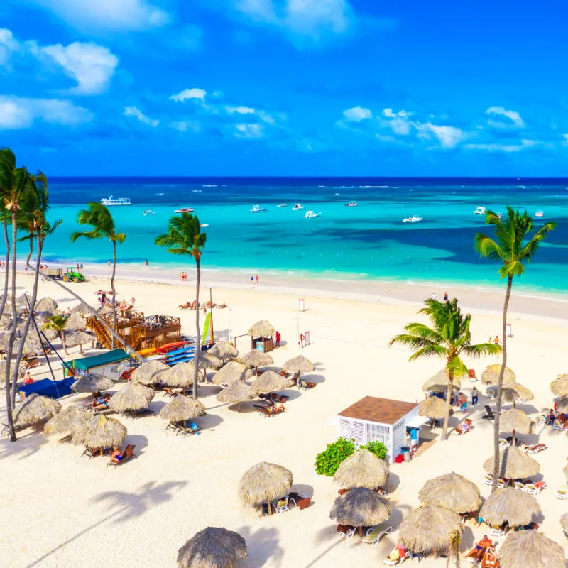 a calm white sand beach in a popular isla muejres location 