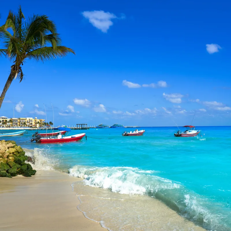 fishing boats on playa del carmen