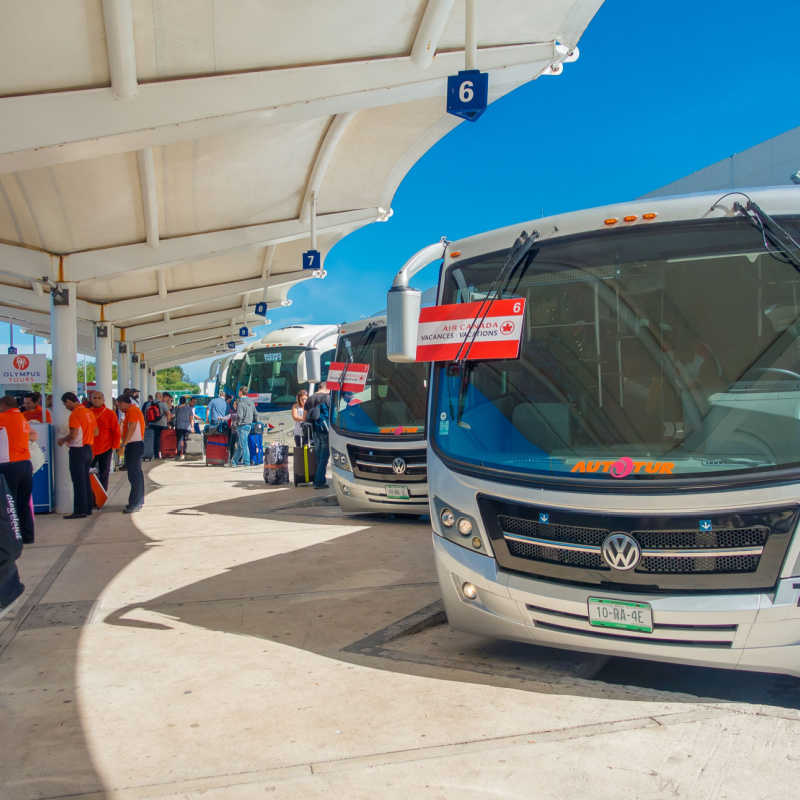 Passenger vans at Cancun bus terminal