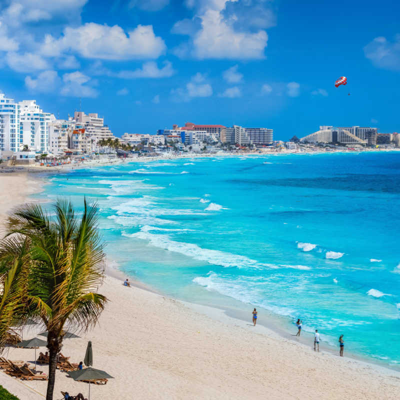view of a white sand beach in cancun 