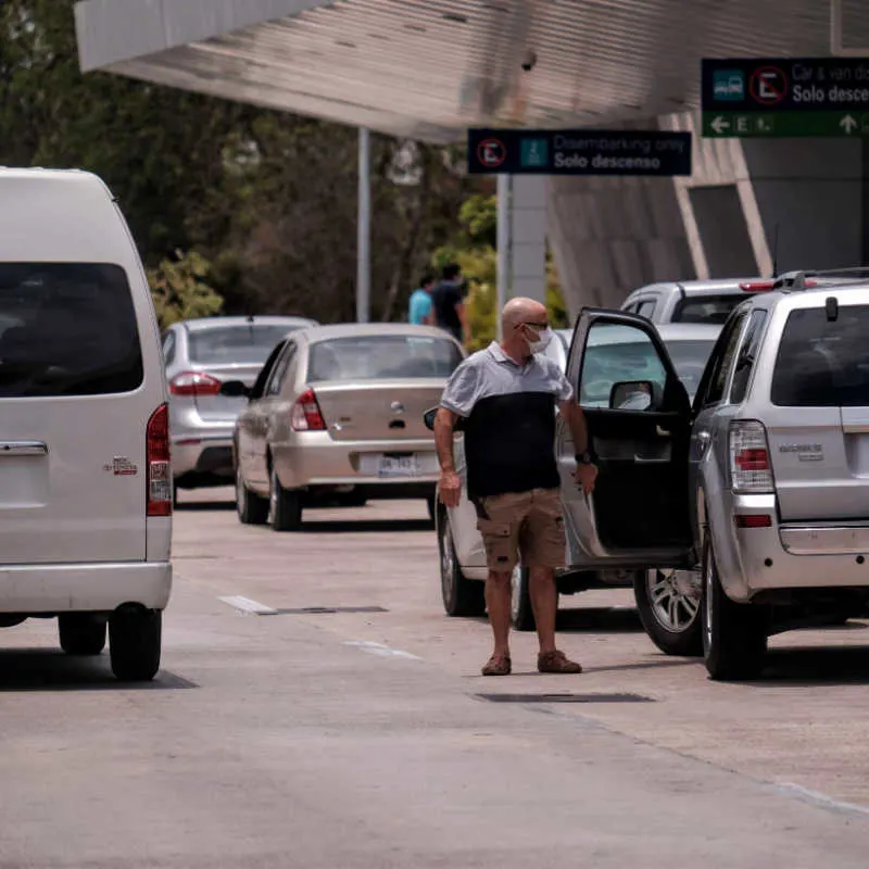 a taxi driver waiting for passengers in Cancun 