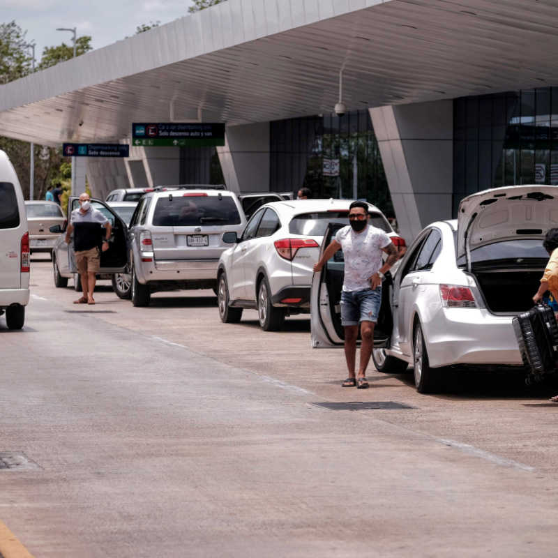 taxi drivers in front of cancun airport 