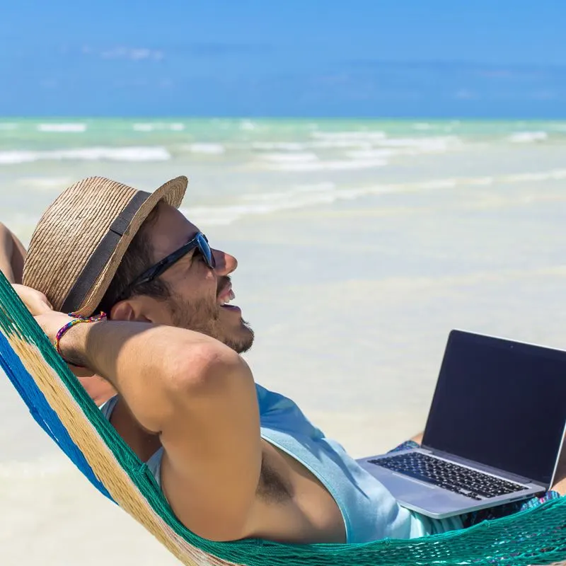 Digital nomad on hammock