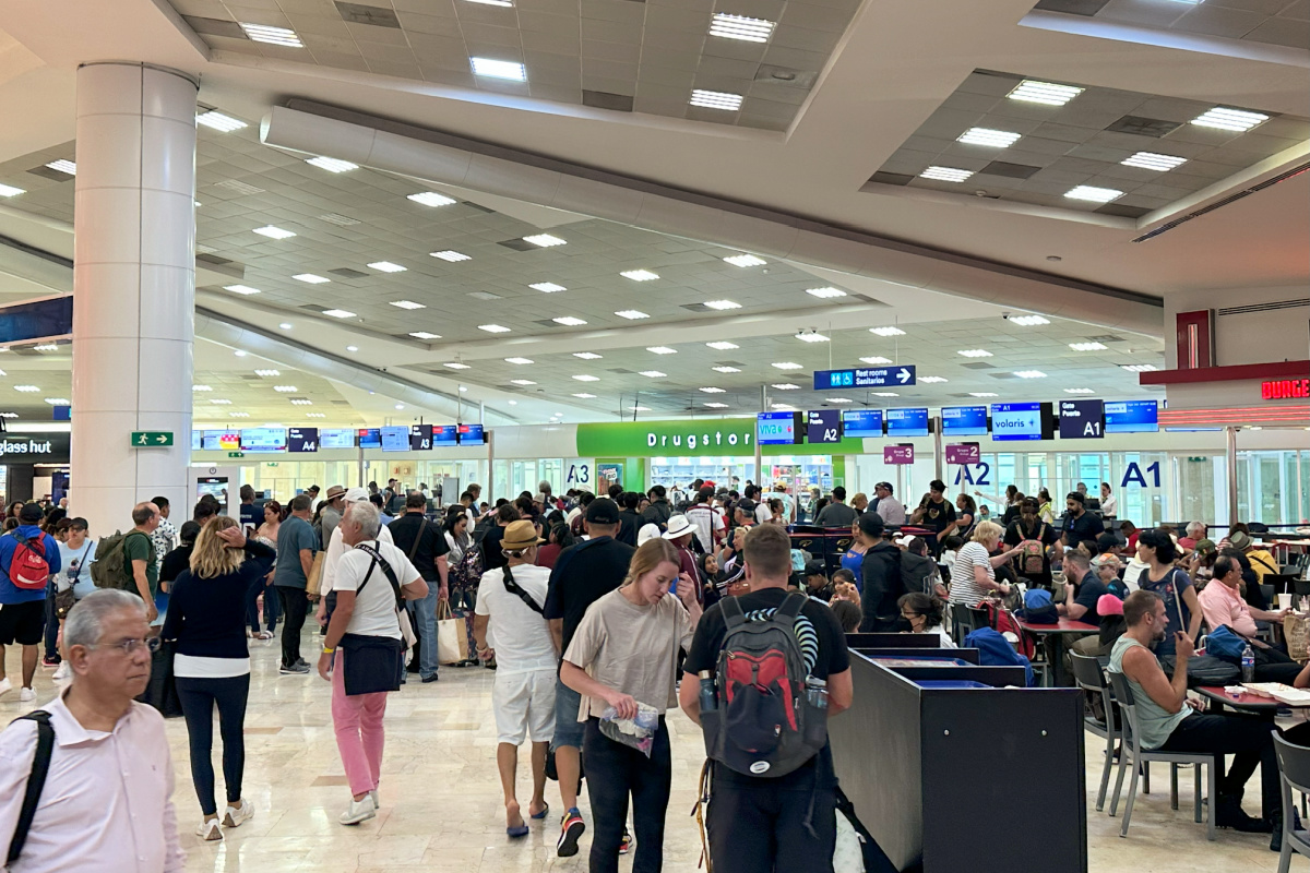 People waiting in line at Cancun airport