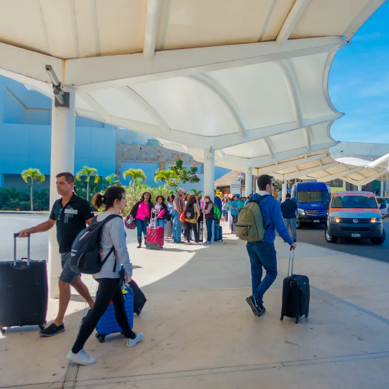 Tourists Being Dropped Off at Cancun International Airport