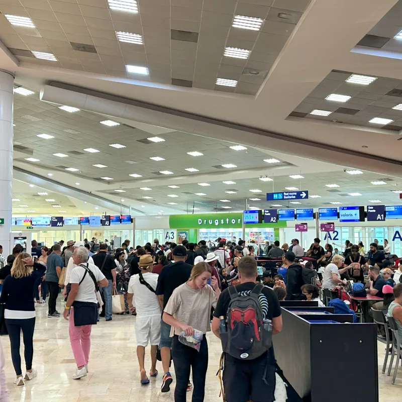 Tourists Inside of Cancun International Airport