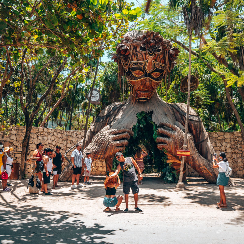 Tulum tourist attraction with tourists taking photos