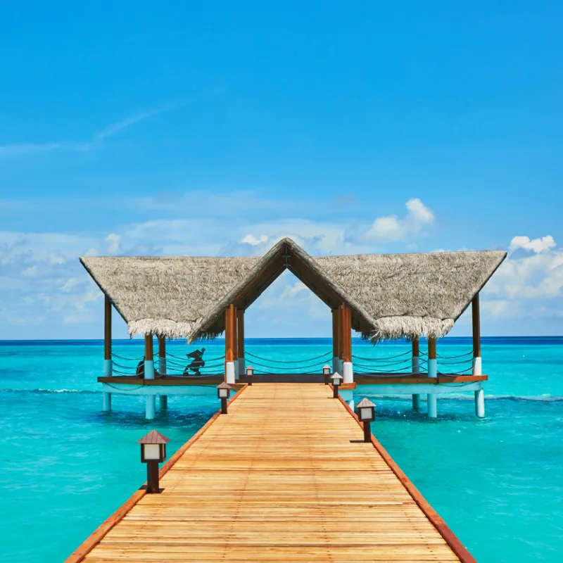 beach lagoon in Bacalar with walkway to the ocean