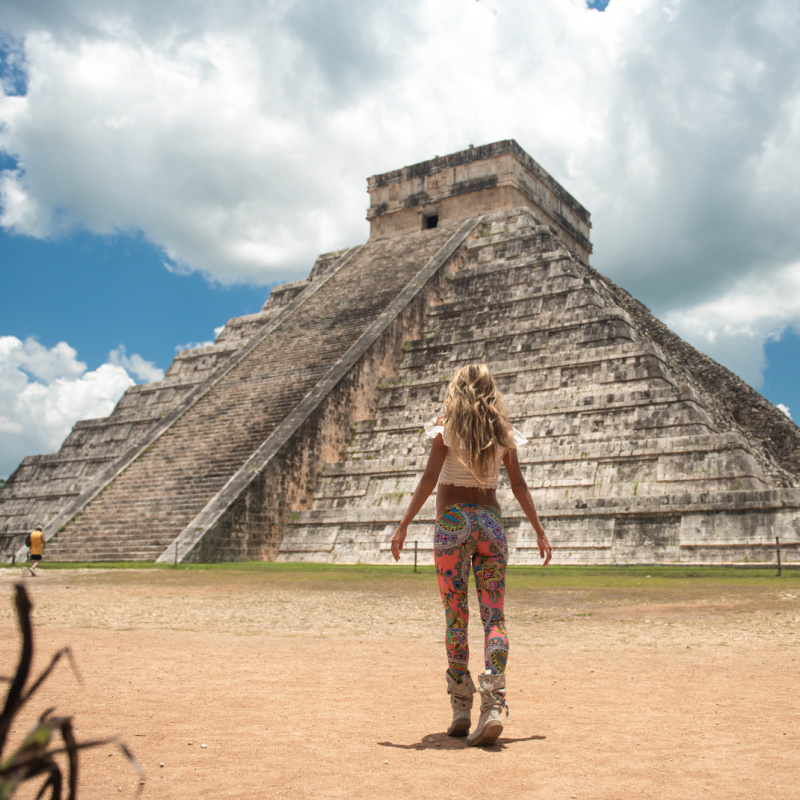 tourist exploring Chichén Itzá