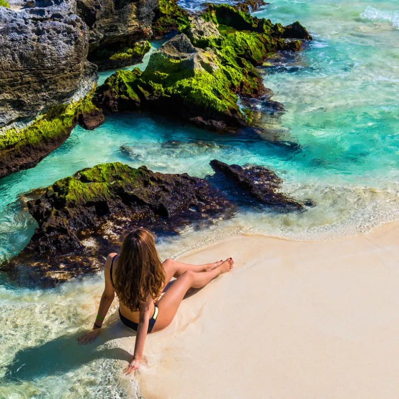 tourists enjoying a beach in playa del carmen