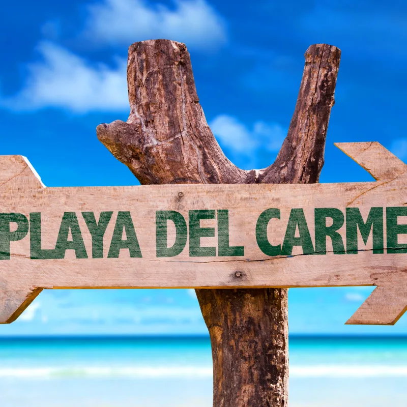 wooden playa del carmen sign