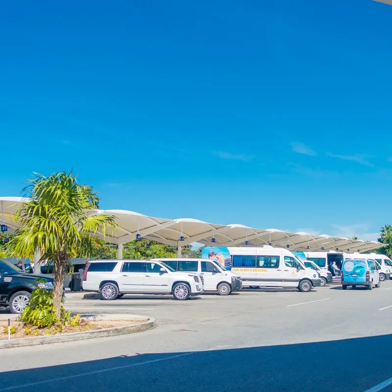 Cars awaiting passengers at Cancun International Airport parking lot