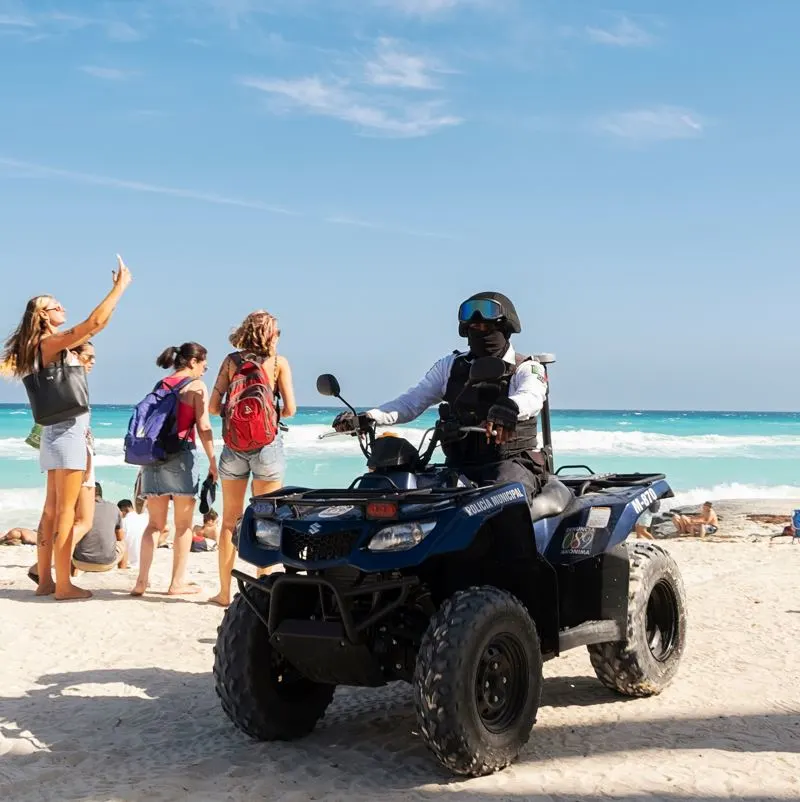 Police on patrol on a Cancun beach