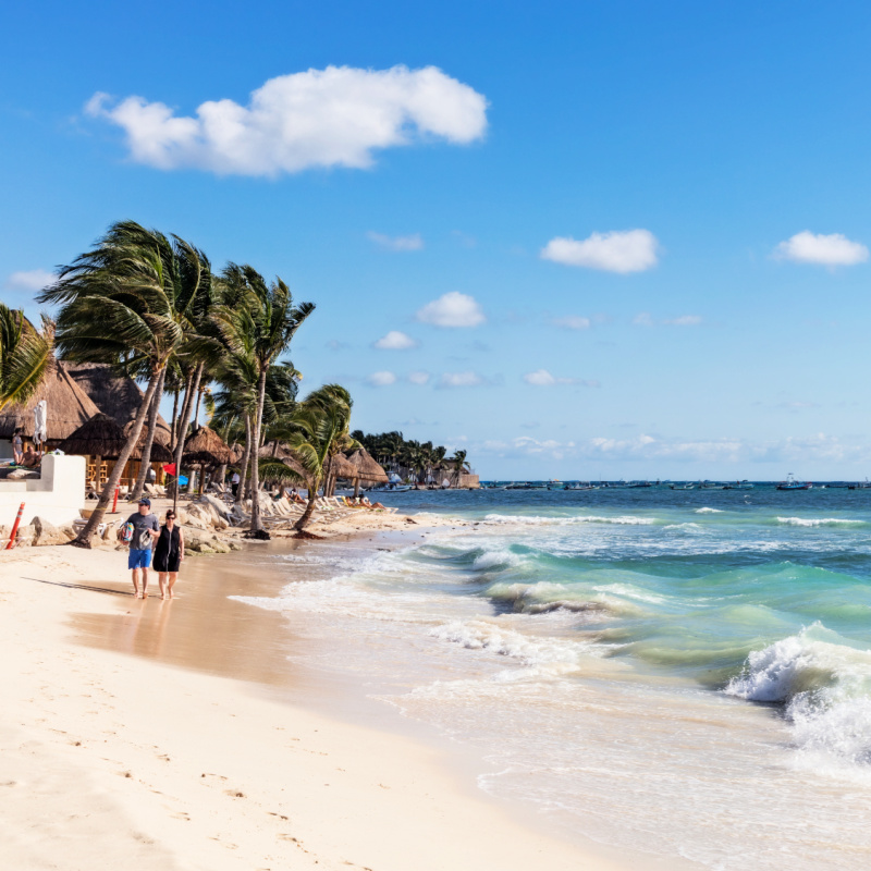 People on the beach in playa del carmen, mexico