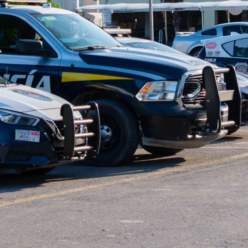 police cars parked in cancun