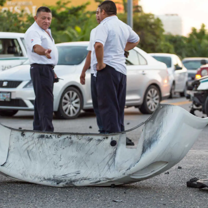 a taxi driver and a police officer after an incident 