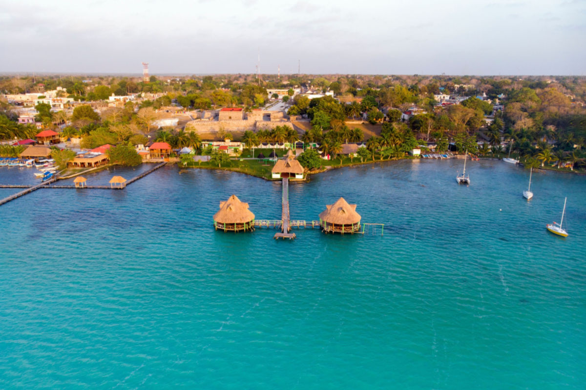 Aerial view of the town of Bacalar with blue water