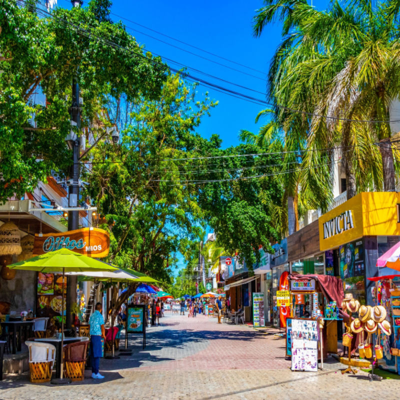 A popular street in Playa del Carmen with travelers