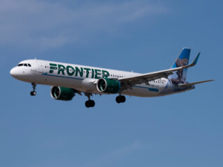 Frontier Airplane in the Air