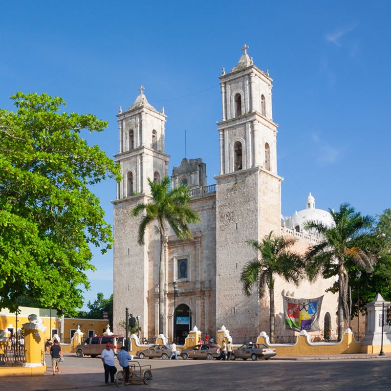 Valladolid, Yucatan, park with trees and the town's parish in the background