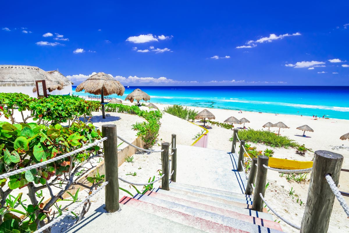 A beach in cancun on a sunny day