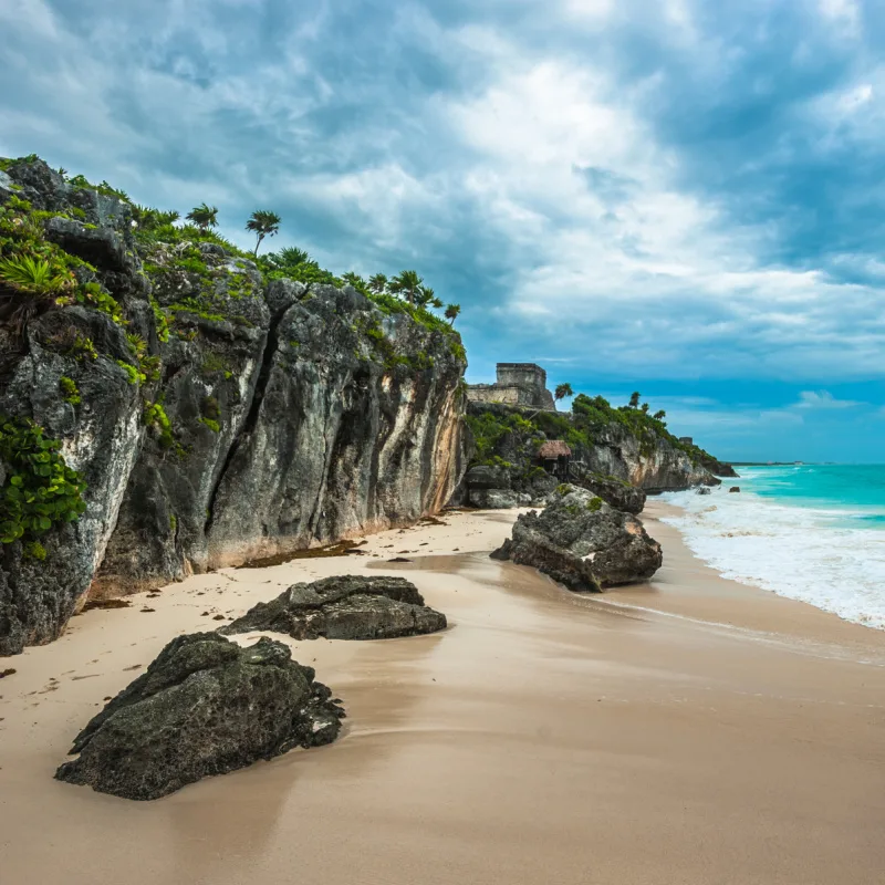 beach in Tulum underneath the Mayan ruins