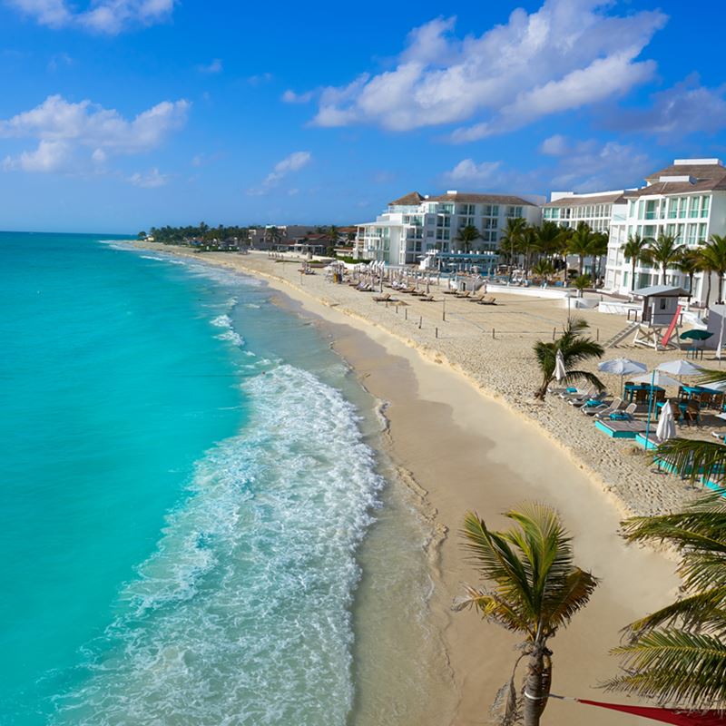 Aerial view of Playa del Carmen with turquoise ocean, beach and resorts