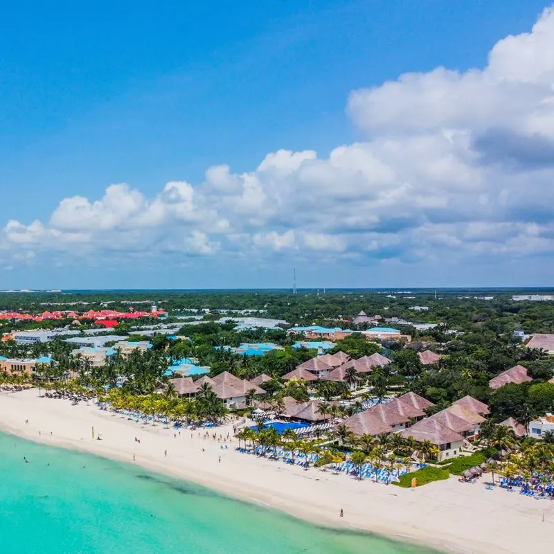 Aerial view of beach in Playa del Carmen, with beautiful turquoise waters, beach, and resorts