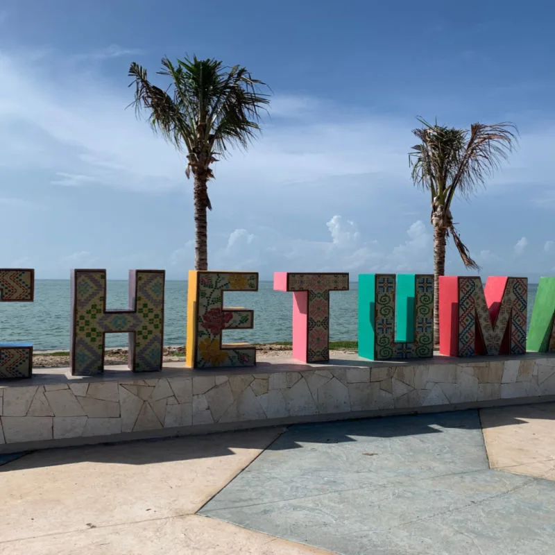 a colorful sign on the esplanade in chetumal 