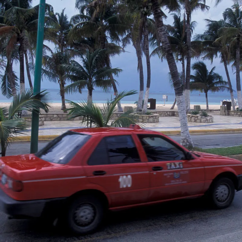 Old Taxi on a Street in Cancun, Mexico