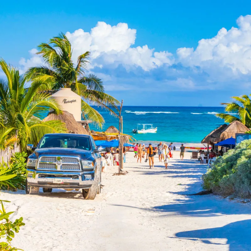 Tourists on a Beautiful Beach in Tulum, Mexico