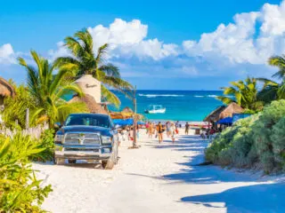 Tourists on a Beautiful Beach in Tulum, Mexico