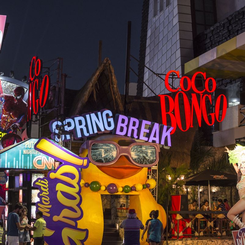 Coco bongo cancun entrance with a spring break sign above the door
