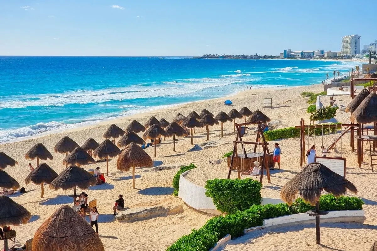 Tourists at Playa Delfines in Cancun