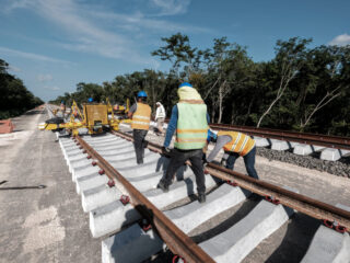 Engineers Working on the Maya Train