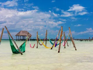 Hammocks in the Water at a Beach in Holbox, Mexico